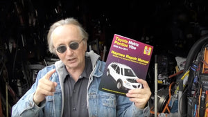 Scotty Kilmer with a Haynes Manual