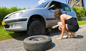 How to jack up a car and change a tire